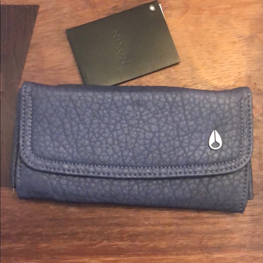 Gray Nixon wallet new with tags. Never used.